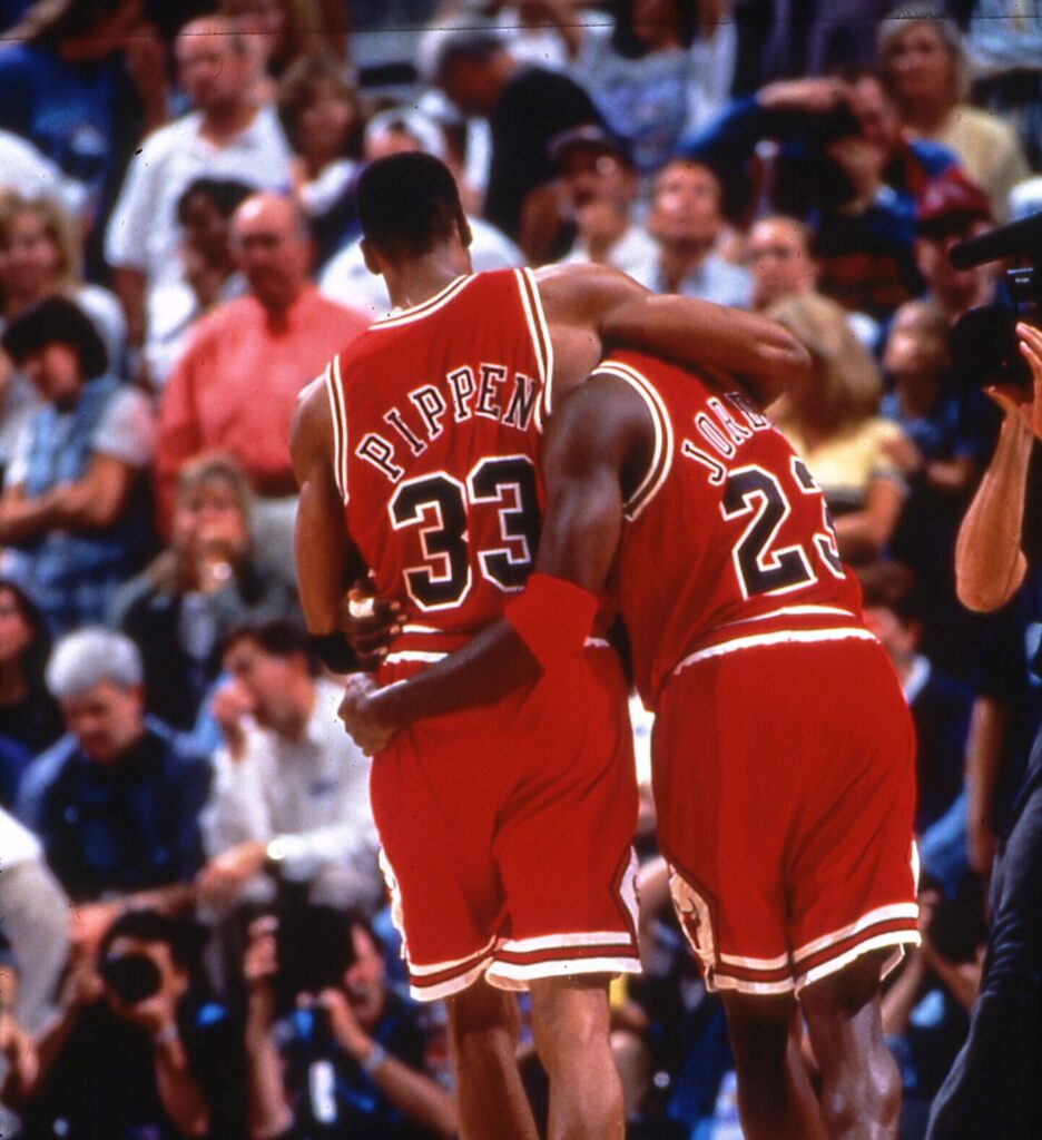 Scottie Pippen hugging Michael Jordan after they won the game 5 playoff final on June 11, 1997.