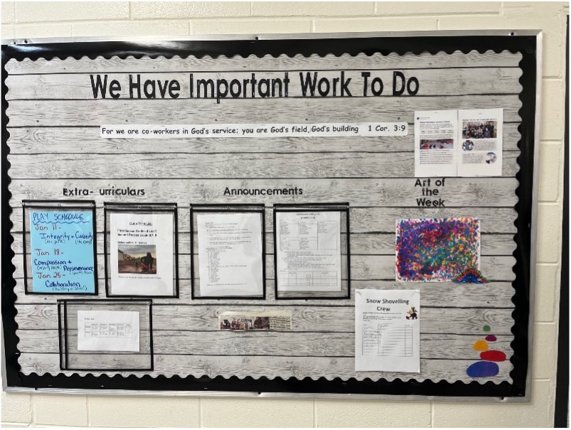 Photo of Front hallway bulletin board at Cairn Christian School: students and staff alike are co-workers in God’s service.